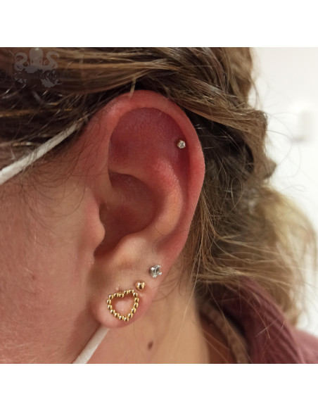 Accessoire en or jaune 18 carats orné d'un cristal Swarovski Threadless