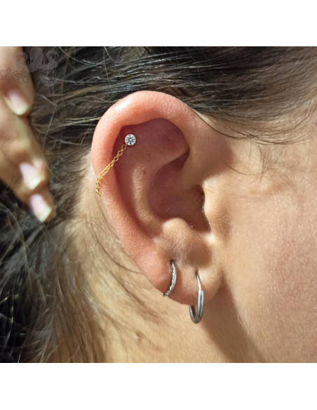 Accessoire en or jaune 18 carats orné d'un cristal Swarovski Threadless