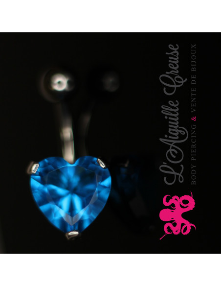 Coeur griffé en argent.